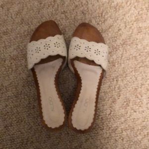 Used white high heel slipper